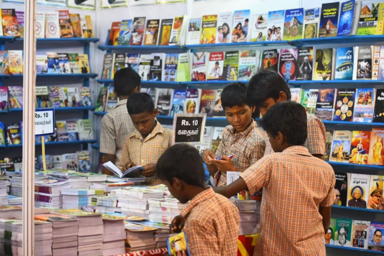 Children browsing books at a book stall